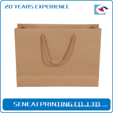 Natural brown shopping/gift/bakery cheap small flat handle kraft paper bag with logo printing